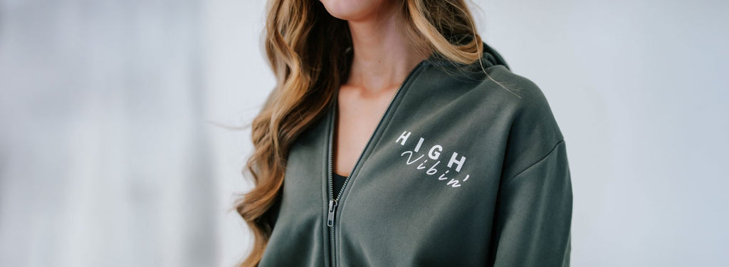 Eco-conscious high vibe hoodie with crystal-infused affirmation print