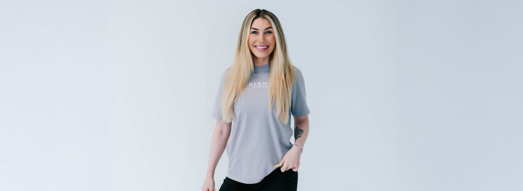 Model wearing energy-infused clothing to elevate vibration