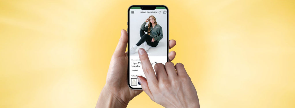 Phone screen with Elevate & Enlighten online shop glowing with frequency